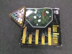 A folding 48 inch Texas Holdam poker table in box together with a boxed set of poker chips