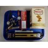 A tray containing miscellaneous to include a boxed Bell's Scotch Whisky decanter, sealed,