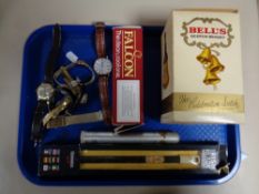 A tray containing miscellaneous to include a boxed Bell's Scotch Whisky decanter, sealed,