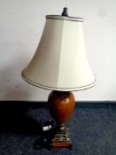 A contemporary table lamp with shade
