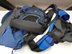 Three back packs and holdalls,