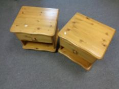 A pair of pine bedside stands fitted a drawer
