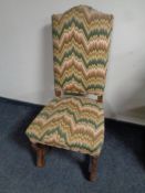 A continental oak upholstered high backed dining chair