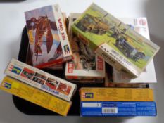 A tray containing 12 assorted Revell and Airfix plastic modelling kits, historic cars,