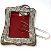 A silver photograph frame,