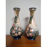 A pair of Moorcroft Sweet Briar vases,