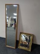 A gilt framed bevel edged hall mirror together with a further gilt framed mirror