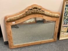 An early 20th century pine over mantel mirror,
