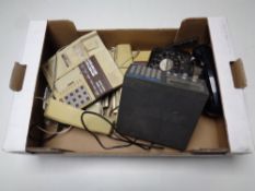 A box containing realistic 400 channel scanner, black Bakelite telephone,