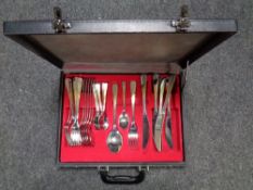 A leather canteen containing Gerlach cutlery