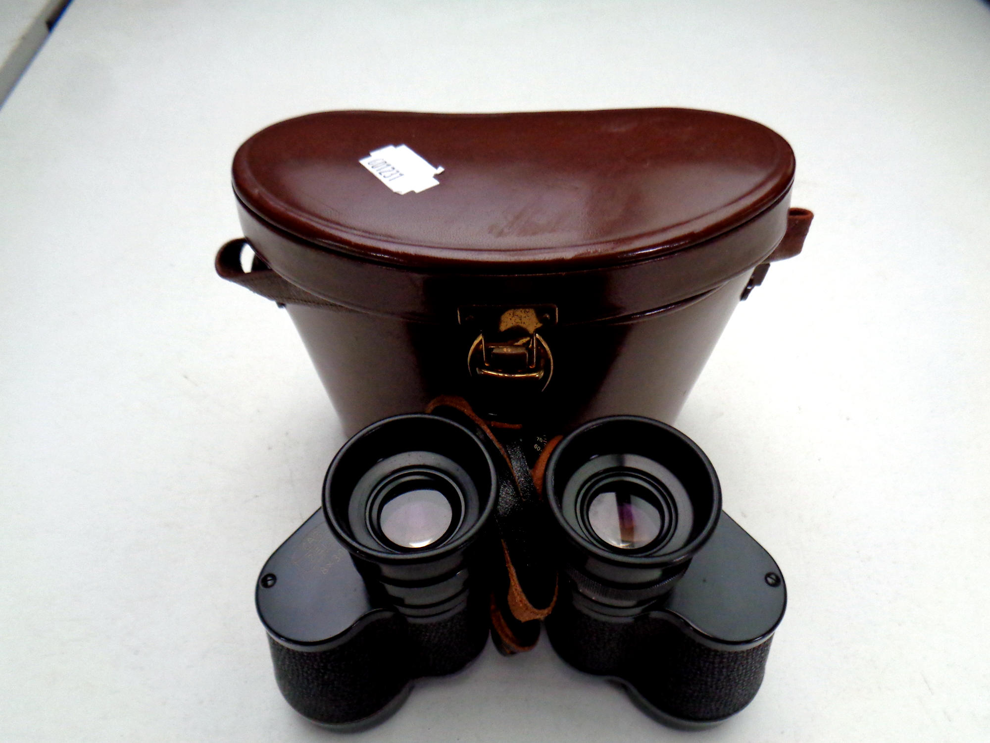 A set of leather cased Carl Zeiss 8 x 30 B field glasses