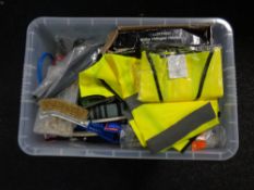 A crate of miscellania : high vis jackets, halogen heaters,