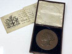 A Victorian bronze Exhibition medal, awarded to J Sherwin class XXII,