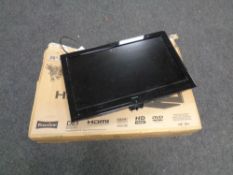 A Hitachi 26 inch LCD TV with lead and wall mounting bracket