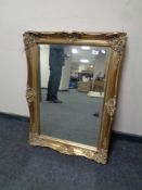 A gilt framed bevel edged mirror (as found)