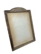 A George V silver easel photograph frame with engine turned decoration, Horton & Allday,