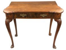 A George II walnut side table, with brass split-pin handles,