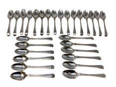 Twenty-eight Georgian silver spoons, many John Lambe examples.