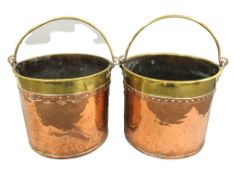 A pair of 19th century copper and brass riveted buckets, with swing handles, height 30 cm,