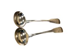 A pair of Georgian silver soup spoons, maker TB, length 17cm. CONDITION REPORT: 125.