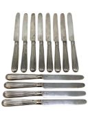 A set of twelve Georgian silver table knives, maker MB.