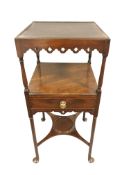 A George III mahogany pedestal washstand, fitted with a drawer and undershelf, standing on pad feet,