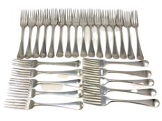 A harlequin set of twenty-six Georgian silver table forks, differing hallmarks.