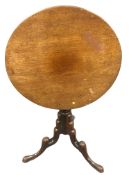 A George III mahogany tilt top tripod table, diameter 60 cm, height 73 cm.