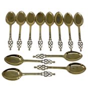 A set of twelve Edwardian silver-gilt spoons, Wakely & Wheeler, London 1901 and 1902.