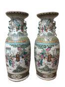 A pair of 19th century Canton baluster porcelain vases,