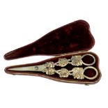 A pair of ornate Georgian silver-gilt grape scissors, maker CR, length 19cm,