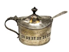 A 19th century silver mustard pot, maker WA, with blue glass liner and associated silver spoon.