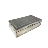 A George VI silver cigarette box, with inscription 'Presented to Mr.