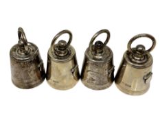 A set of four Edwardian silver pepper grinders, Joseph Braham, London 1903, of bell form,