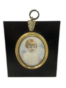 An early 19th century portrait miniature depicting a child, 5 cm x 6.