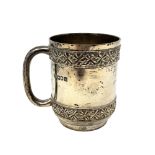 An Edwardian silver mug, Searle & Co Ltd, London 1904, height 9cm.