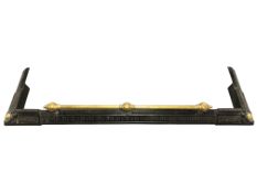 An early 19th century cast iron and brass fire curb, width 136 cm, depth 37 cm,