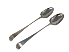 A pair of Georgian silver basting spoons, marks rubbed, length 30cm.