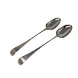 A pair of Georgian silver basting spoons, marks rubbed, length 30cm.