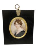 An early 19th century portrait miniature depicting a lady in black dress, 5 cm x 6.5 cm, framed.