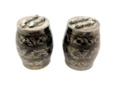 A pair of continental niello silver salt barrels, height 5cm.