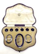 A fine quality cased silver gilt and purple enamel buckle, pair of shoe buckles, and six buttons,