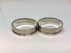 A pair of oval silver napkin rings,