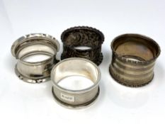 Four assorted silver napkin rings CONDITION REPORT: 68.