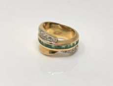 An 18ct gold emerald and diamond ring, size N CONDITION REPORT: 11.