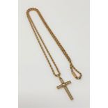 An antique gold seed pearl set cross pendant on 9ct gold chain CONDITION REPORT: 6g