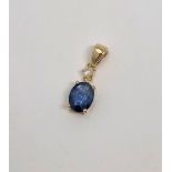 A 14ct gold sapphire and diamond pendant, the sapphire 1.45 carat, the diamond 0.07 carat.