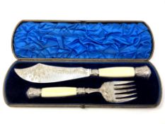 A fine boxed pair of Victorian silver and ivory fish servers, Sheffield 1879.