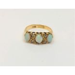 An antique 18ct gold opal and diamond ring,