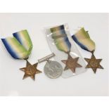 Three WWII Atlantic Stars with ribbons,